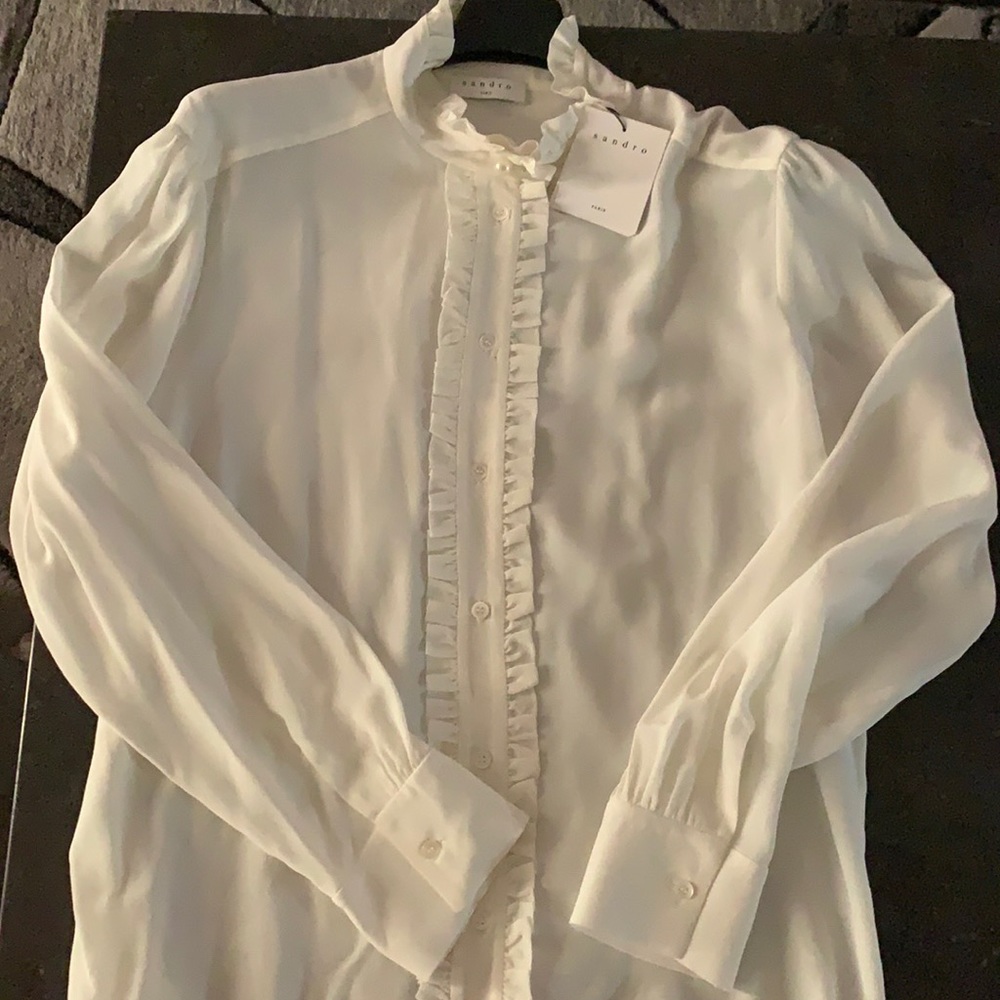 Beautiful Sandro blouse with a pearl